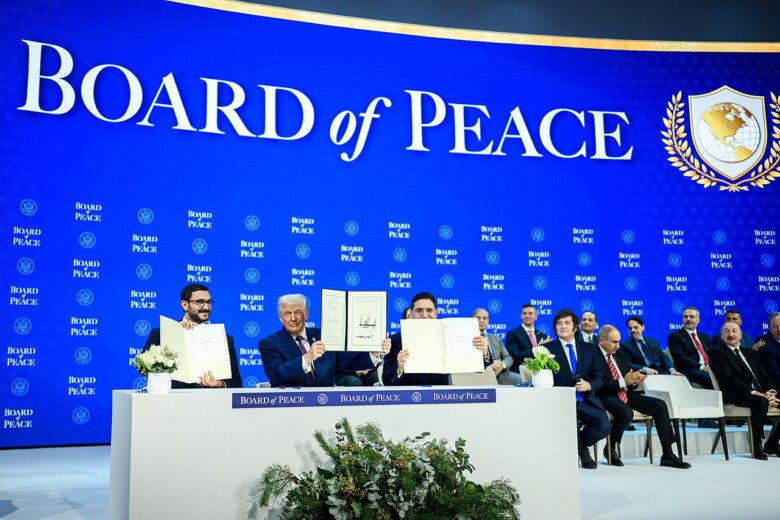 photo of signing Board of Peace Charter